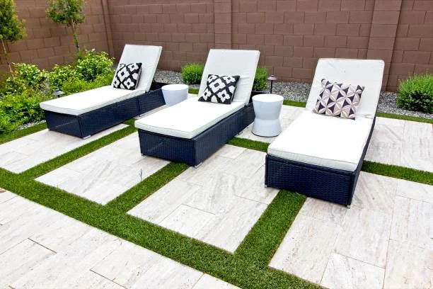 Personalized artificial grass layout for patio areas