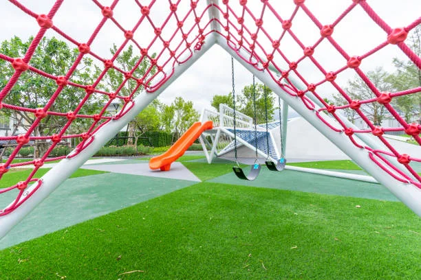 Safe artificial turf for playground areas